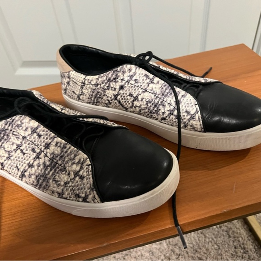 Women’s Cole Haan Black and White Slip-On Sneakers